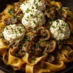 Creamy chicken and mushroom pappardelle pasta topped with burrata cheese