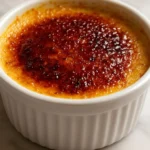 Deliciously rich Crab Brulee served in a stylish dish