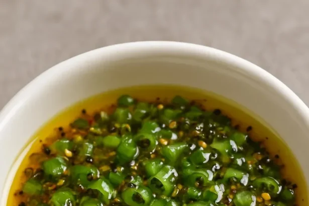 A vibrant ginger lime sauce served in a bowl, ideal for enhancing various dishes.