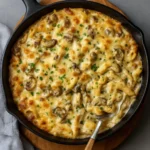 Creamy Mushroom and Garlic Dip served in a bowl with bread and vegetables
