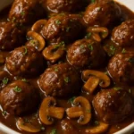 Salisbury steak meatballs served with gravy and mashed potatoes