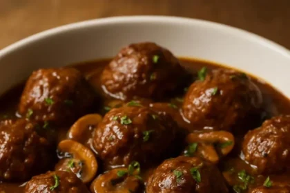 Salisbury steak meatballs served with gravy and mashed potatoes