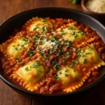 Slow Cooker Cheesy Ravioli with Meat Sauce served in a bowl