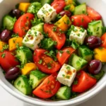 Delicious Vegan Greek Salad with fresh vegetables and olives